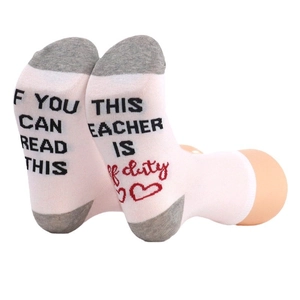 Funny pink cotton socks with teacher off duty message and red heart on the soles