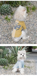 Detail of striped dog t-shirt featuring vintage print and breathable knit texture