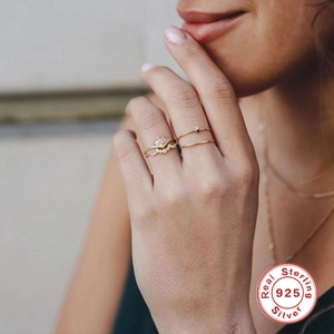 S925 sterling silver irregular ring set with pavé zircon stones on female hand