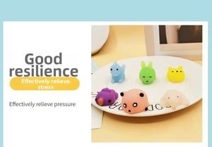 Detailed view of 6 colorful squishy animal toys in a ceramic bowl showing TPR texture