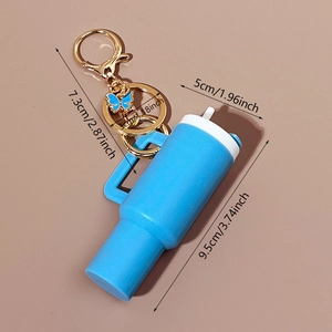 Blue mini tumbler keychain with butterfly charm and detailed size measurements