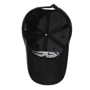 Internal view of washed vintage black cotton baseball cap with adjustable metal buckle strap