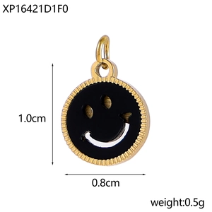 Détail d'un pendentif sourire noir avec bordure dorée et dimensions précises indiquées