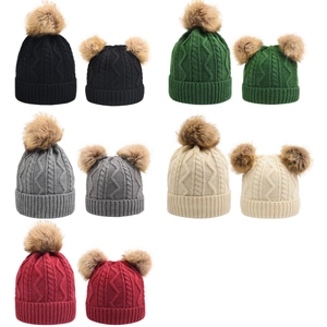 Detailed grid of ribbed knit hats with faux fur pom-poms in five assorted winter colors