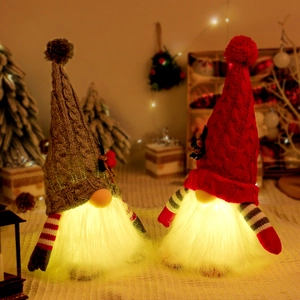 Set of 2 glowing Christmas gnomes with warm LED lights and striped knit hats for holiday decor