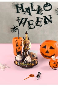 3D Halloween paper tiered tray with castle and pumpkin design for party treats