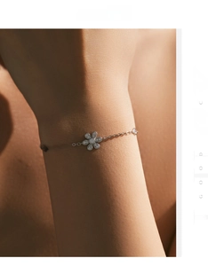 Detailed view of an S925 sterling silver flower bracelet with sparkling zircon stones