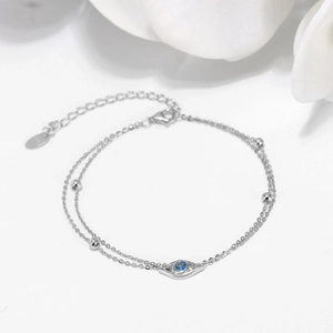 Silver double-layer evil eye bracelet with blue zircon and adjustable chain link