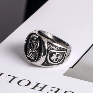 Vintage gothic skull ring in stainless steel with detailed reaper relief and silver finish