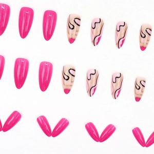 Almond press-on nails with hot pink polish and black abstract line art on nude base