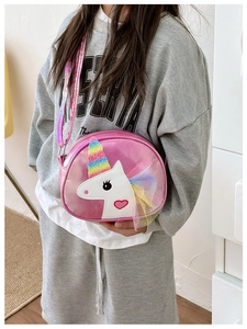 Pink unicorn crossbody bag for girls with glitter horn and rainbow tulle mane detail