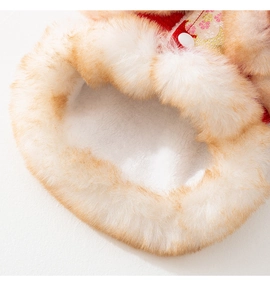 Detail of red Chinese style pet winter coat with floral embroidery and warm faux fur lining