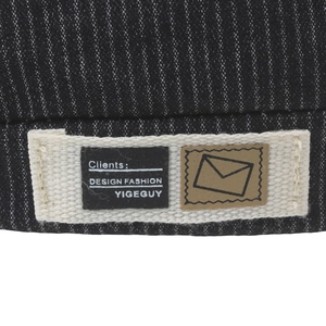 Men's summer striped beret hat with vintage fashion tag and casual ivy cap texture