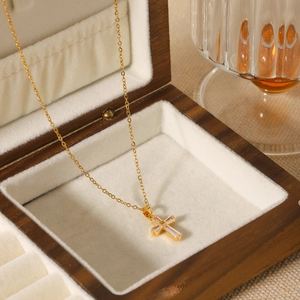 18K gold plated stainless steel cross necklace with zircon stones in a wooden jewelry box