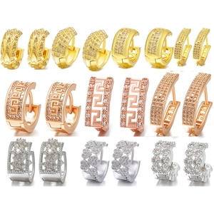 Collection of copper ear hoops with cubic zirconia and various metal plating finishes