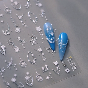 Winter snowflake and star nail art stickers with silver embossed jewelry motifs