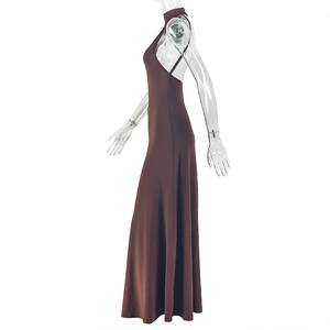 Side view of dark brown halter maxi dress with backless design and A-line silhouette
