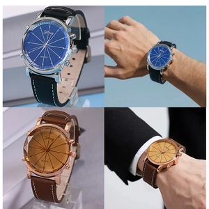 Detail of quartz watches with blue and brown dials featuring unique geometric cut glass