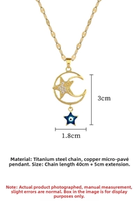 Close-up of gold moon and star necklace with micro-pave stones and blue evil eye detail