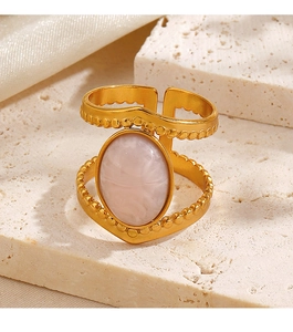 Detail of 18K gold plated double-layered ring featuring a pink oval gemstone inlay