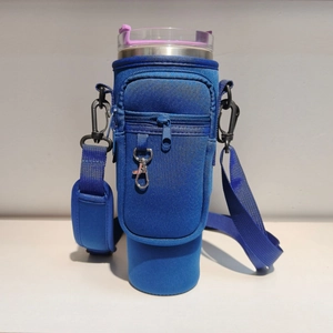 Blue neoprene water bottle carrier with front zipper pocket and adjustable strap
