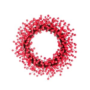 Christmas red berry wreath decoration with dense berries and rustic wooden frame base