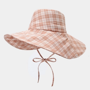 Detail of orange plaid wide brim sun hat with adjustable matching windproof chin strap