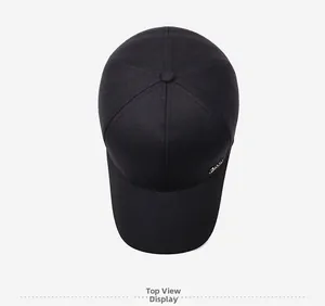 Top view of classic six-panel black baseball cap with metallic logo detail