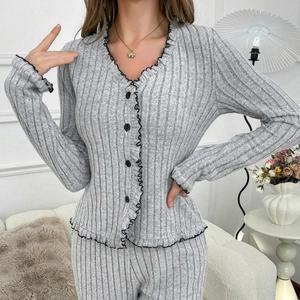 Women's grey ribbed knit pajama set with V-neck cardigan and black ruffle trim detailing