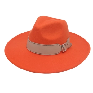 Close-up of orange fedora wool hat featuring a beige leather belt with a silver buckle