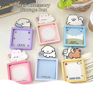 Detailed overhead view of six colorful cartoon jewelry organizers in various pastel colors