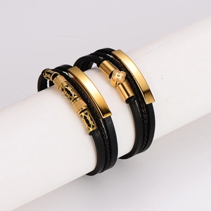 Men's multilayer braided leather bracelet with golden stainless steel accents on stand
