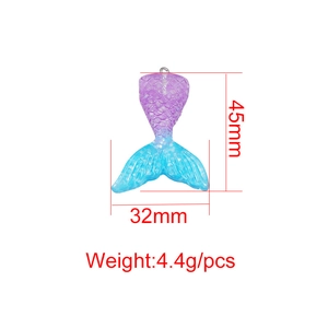 Resin mermaid tail pendant in gradient blue and purple with scale texture and glitter