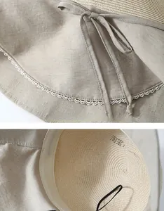 Detail of beige straw sun hat featuring white lace trim and bow knot ribbon detail