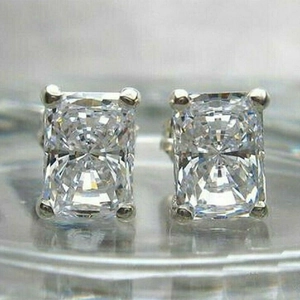 Classic silver rectangular cubic zirconia stud earrings with a four-prong radiant cut