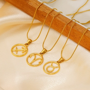 Three gold zodiac necklaces with hollow Sagittarius, Aries, and Taurus pendants