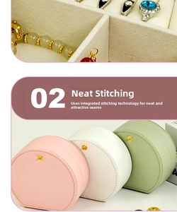 Detail view of portable leather jewelry box showing stitching and compact compartments