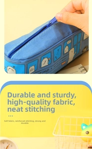 Detail of creative bus-shaped pencil case showing blue canvas texture and zipper closure