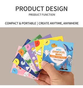 Handheld view of various mini cartoon graffiti books with colorful animal and space covers