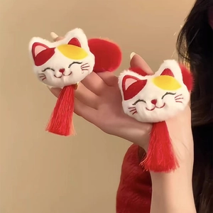 Cute plush Lucky Cat hair ties with long red tassels and soft white faux fur details