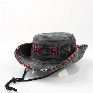Close-up of washed gray cotton sun hat with ethnic woven band and adjustable chin strap