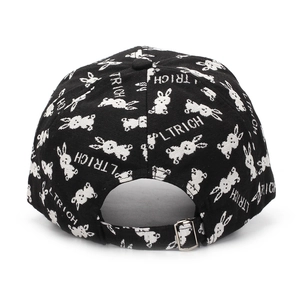 Detail of black cotton baseball cap with white rabbit embroidery and metal buckle