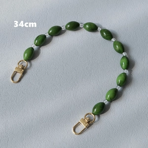 Detailed 34cm green acrylic bead chain with gold metal clasps for handbag handles