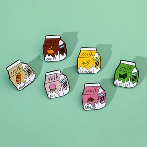 Detailed collection of six cartoon milk carton enamel pins in various fruit flavors