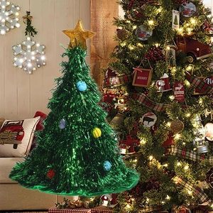 Detailed view of festive Christmas tree hat with colorful baubles and a gold star top