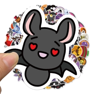 Close-up of a waterproof cartoon black bat sticker for Halloween party decorations