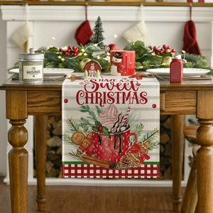 Christmas table runner with gingerbread and hot cocoa pattern on a rustic wooden table