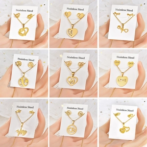 Nine sets of gold stainless steel heart and love pattern necklaces and earrings sets