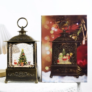 Vintage bronze Christmas lantern music box with Santa and tree miniature landscape