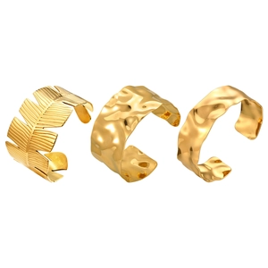 Minimalist 3-piece set of gold stainless steel feather and hammered open cuff bracelets